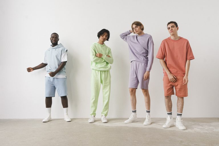 Four male models modeling ASOS menswear.