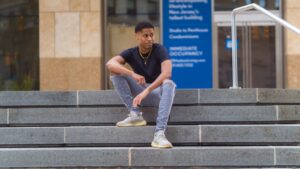 Highlighting fashion-forward style, Tyler Jurelle wears PRSTGE jeans and Adidas Yeezy Boost 350 V2 Sneakers. Check out his official PRSTGE review and recommendations.