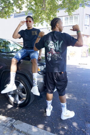 Modeling Royal One Soul with Joshua, Tyler Jurelle exemplifies strong streetwear synergy.