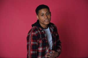 A 3/4 body shot of Tyler Jurelle, captured in a professional studio setting for a pop-up photoshoot.