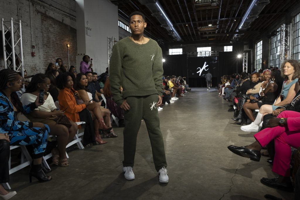 A focused moment during New York Fashion Week, Tyler walks in Vaughn Acquis’s wool set.