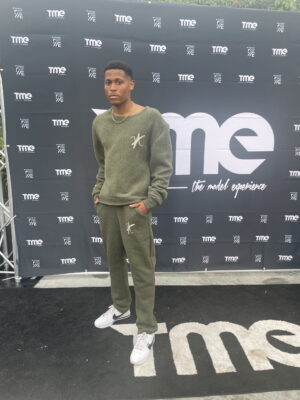 Ready to shine on the New York Fashion Week runway in a khaki green wool set.