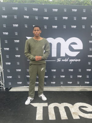 Fashion is in focus behind the Model Experience catwalk, with a khaki green set by Vaughn Acquis.