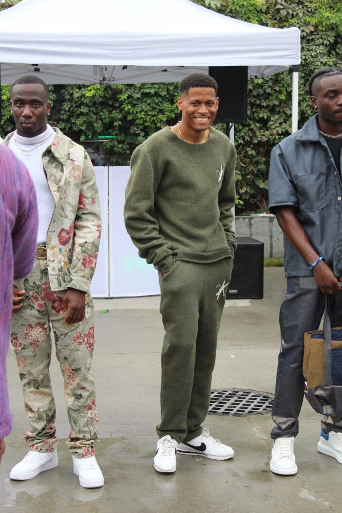 Fashion creator Tyler Jurelle is standing strong with fellow models, all dressed in Vaughn Acquis designs for New York Fashion Week.