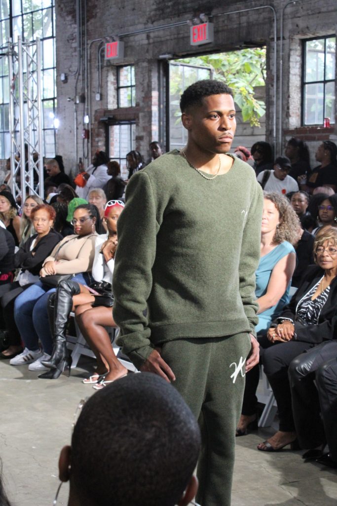 Tyler Jurelle displays a strong and stylish walk down the runway while representing Vaughn Acquis at New York Fashion Week.