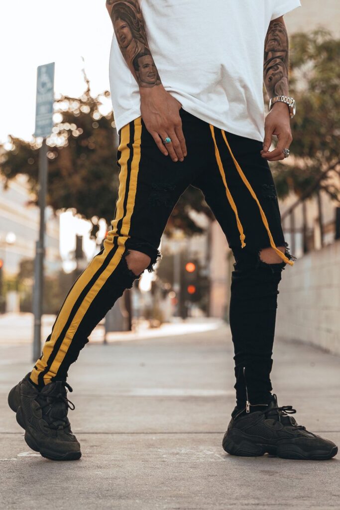 Hoodstore (now PRSTGE) former Double Striped Track Jeans V2 in Black and Yellow.