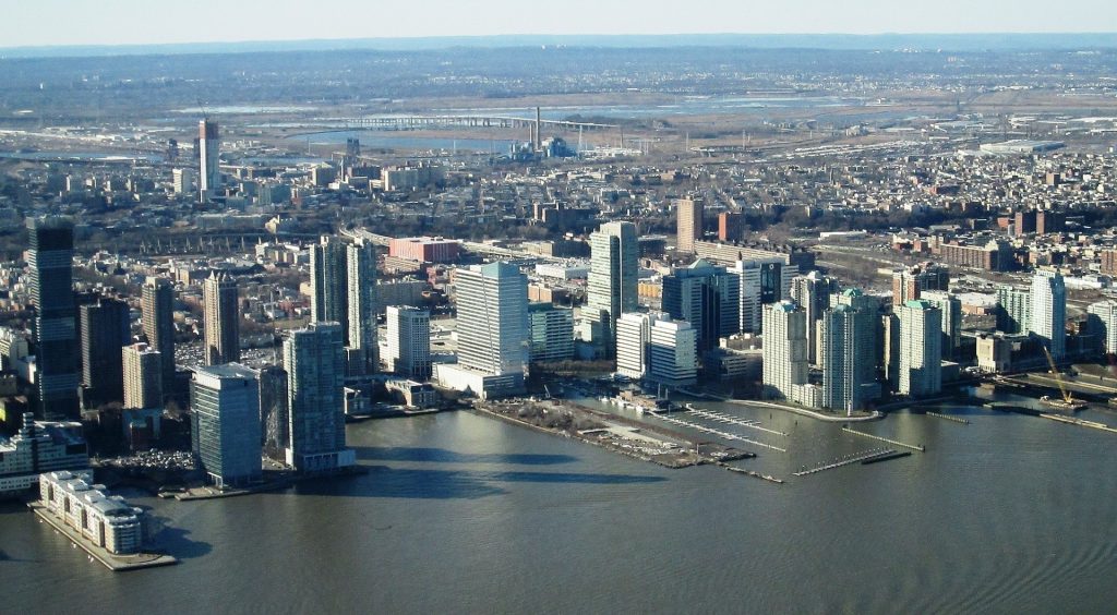 A view west-northwest of the Jersey City skyline from the One World Observatory at One World Trade Center, Manhattan, New York City.